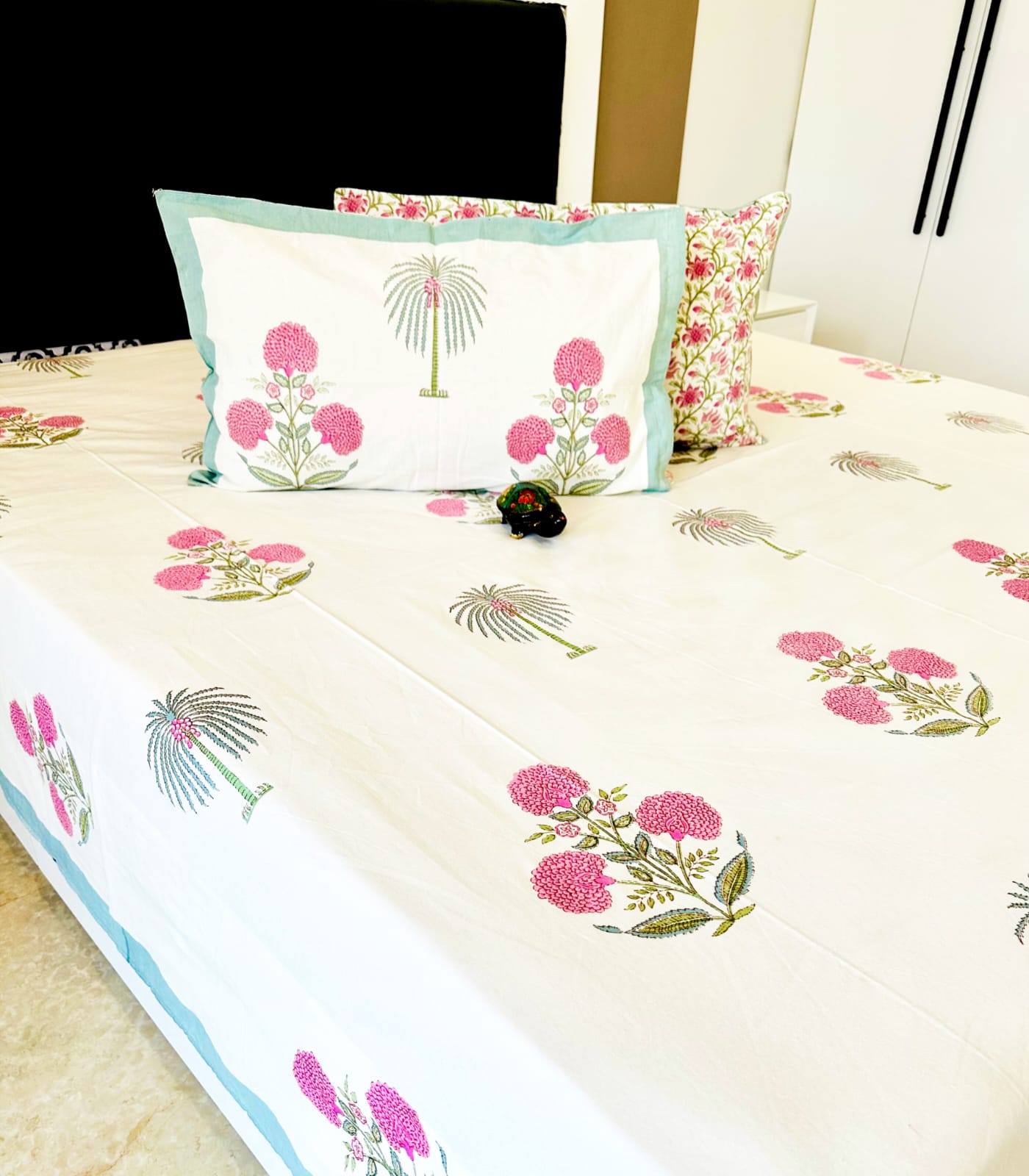 Pink Coco Traditional Printed Bedsheet with Two Reversible Pillow Covers