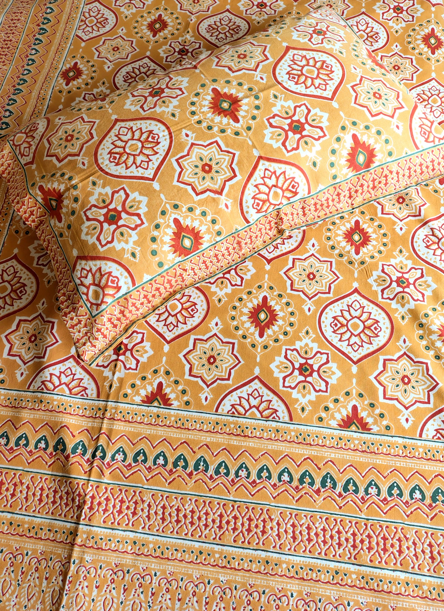 Yellow Geometric Traditional Printed Bedsheet with Two Reversible Pillow Covers
