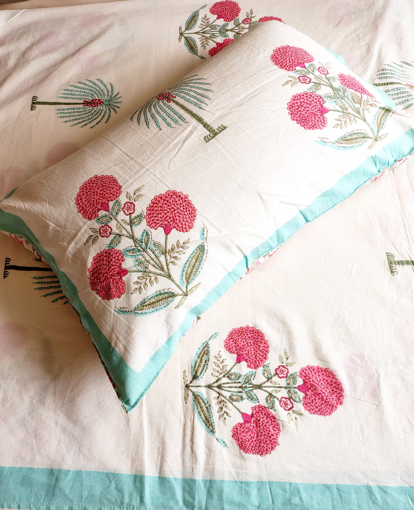 Pink Coco Traditional Printed Bedsheet with Two Reversible Pillow Covers
