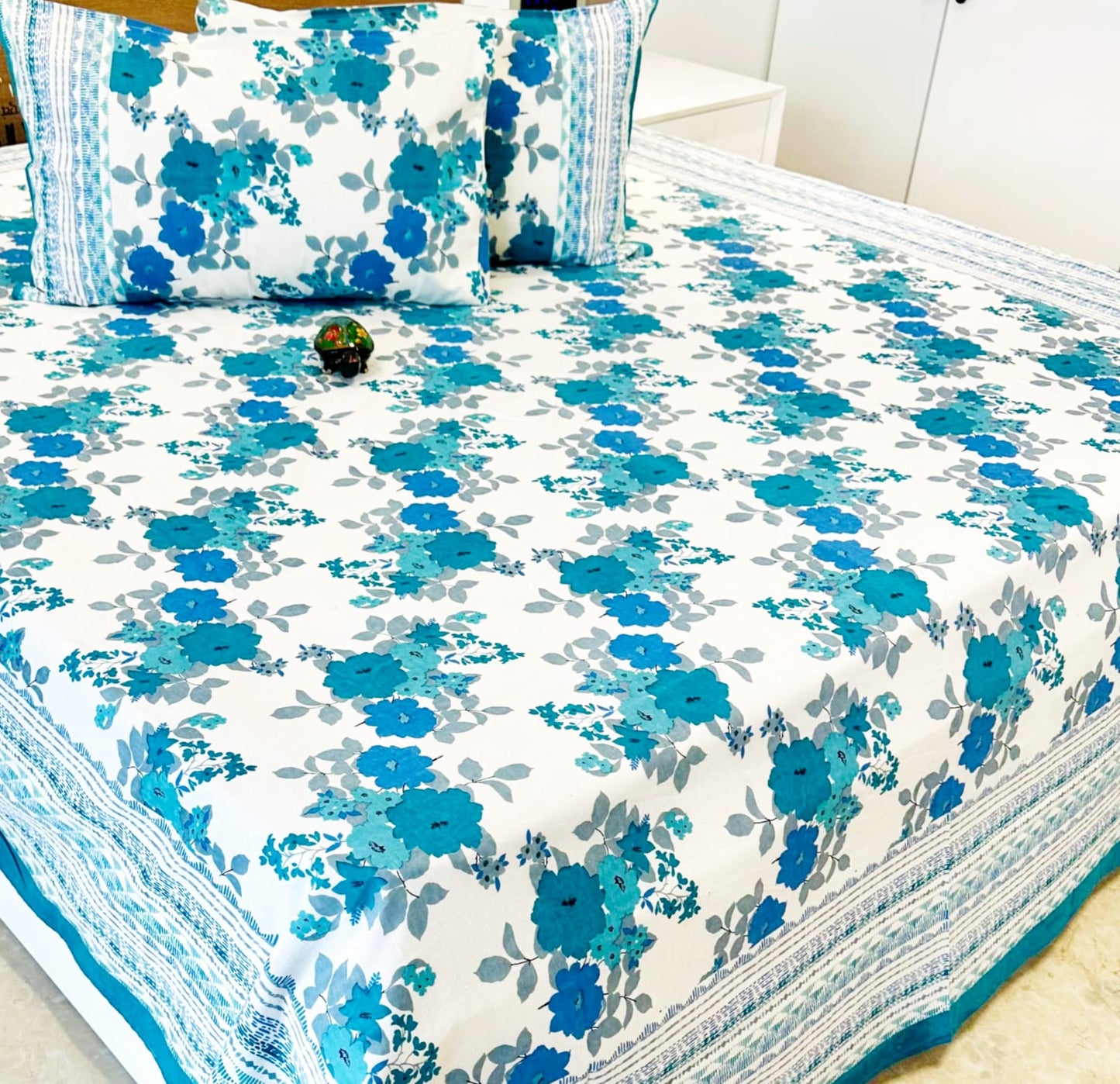 Sea Blue Floral Traditional Printed Bedsheet with Two Reversible Pillow Covers