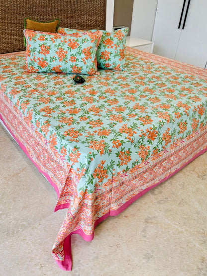 Orange Floral Traditional Printed Bedsheet with Two Reversible Pillow Covers