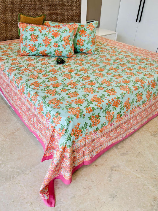 Orange Floral Traditional Printed Bedsheet with Two Reversible Pillow Covers