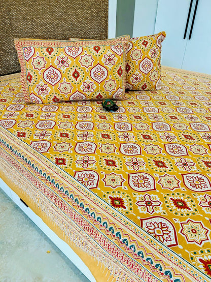 Yellow Geometric Traditional Printed Bedsheet with Two Reversible Pillow Covers