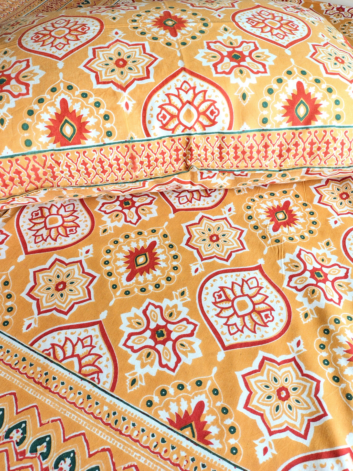 Yellow Geometric Traditional Printed Bedsheet with Two Reversible Pillow Covers