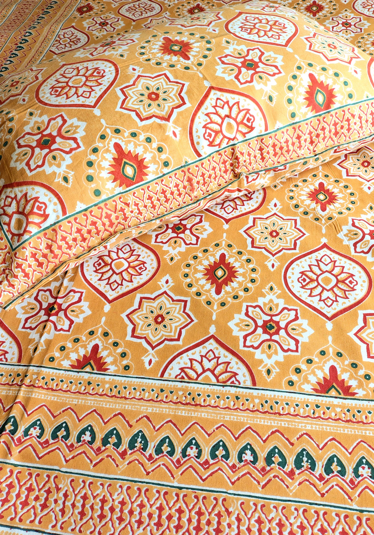 Yellow Geometric Traditional Printed Bedsheet with Two Reversible Pillow Covers