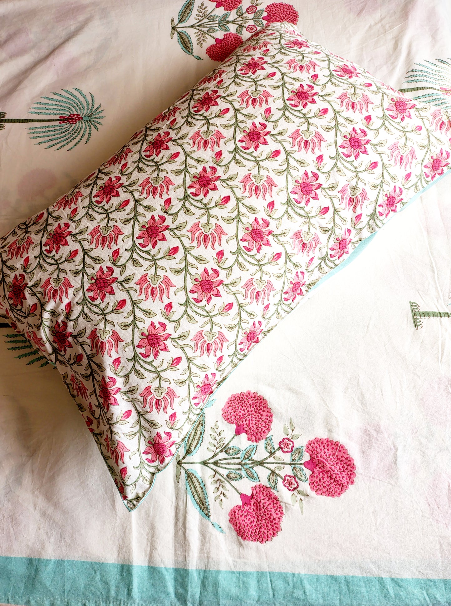 Pink Coco Traditional Printed Bedsheet with Two Reversible Pillow Covers