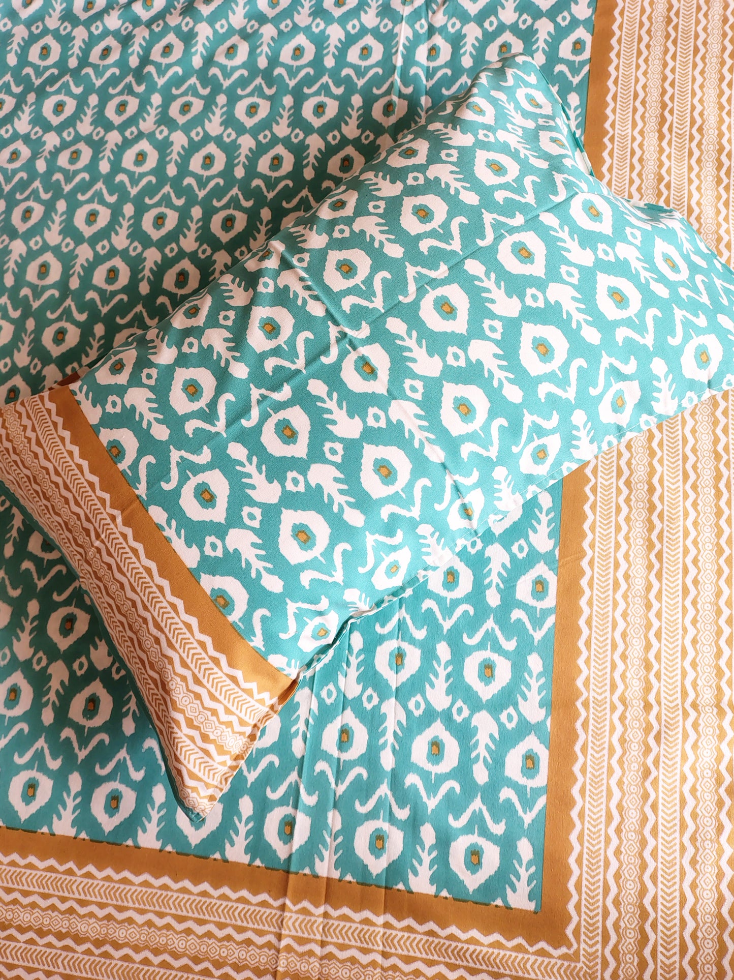 Sea Green Ikkat Traditional Printed Bedsheet with Two Reversible Pillow Covers