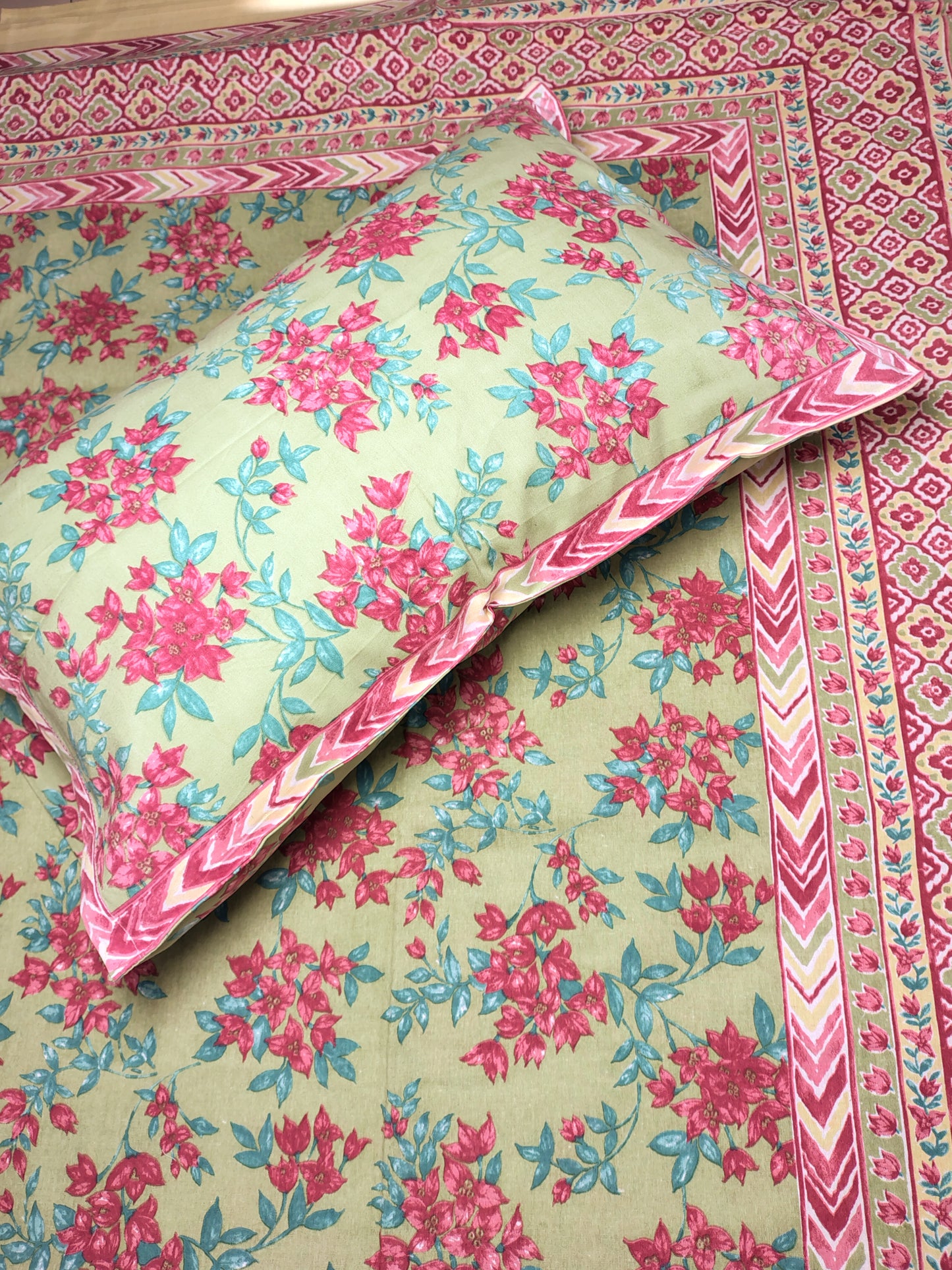 Pista Floral Traditional Printed Bedsheet with Two Reversible Pillow Covers