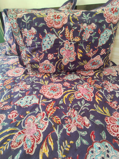 Purple Floral Block Printed Bedsheet with Two Reversible Pillow Covers