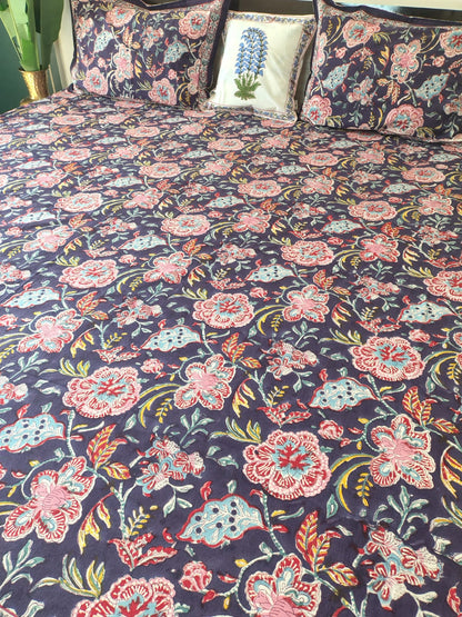 Purple Floral Block Printed Bedsheet with Two Reversible Pillow Covers