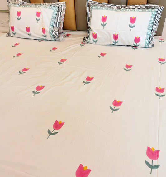 Begum Pink Tulip Block Printed Bedsheet with Two Reversible Pillow Covers