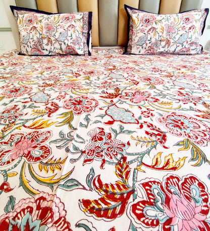 Begum Purple Floral Block Printed Bedsheet with Two Reversible Pillow Covers