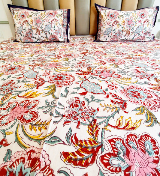 Begum Purple Floral Block Printed Bedsheet with Two Reversible Pillow Covers