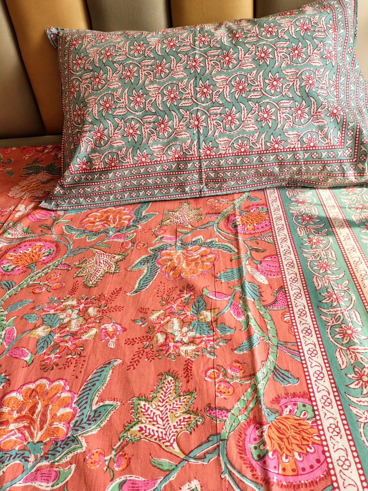 Orange Floral Jaal Traditional Printed Bedsheet with Two Reversible Pillow Covers
