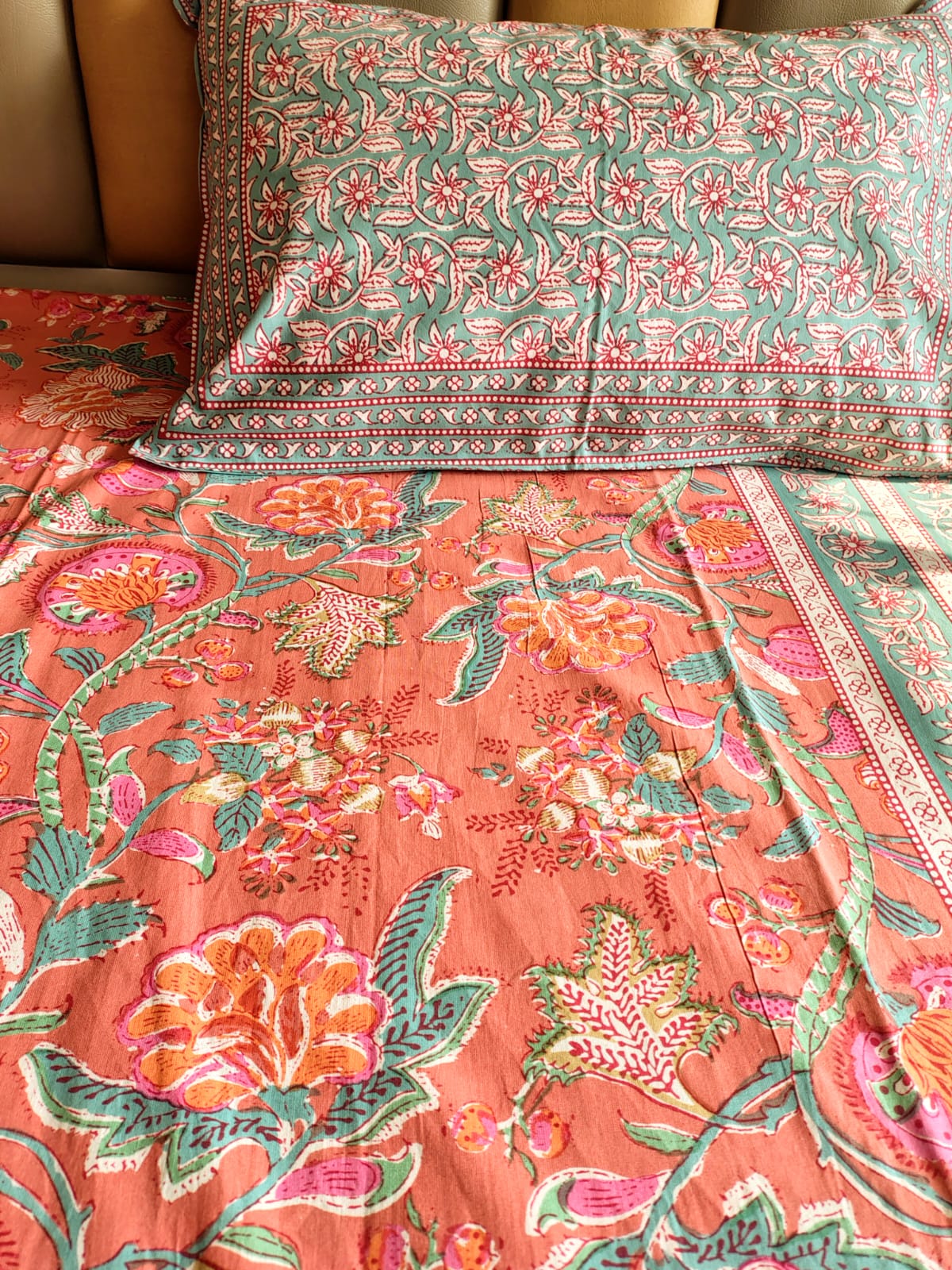 Orange Floral Jaal Traditional Printed Bedsheet with Two Reversible Pillow Covers
