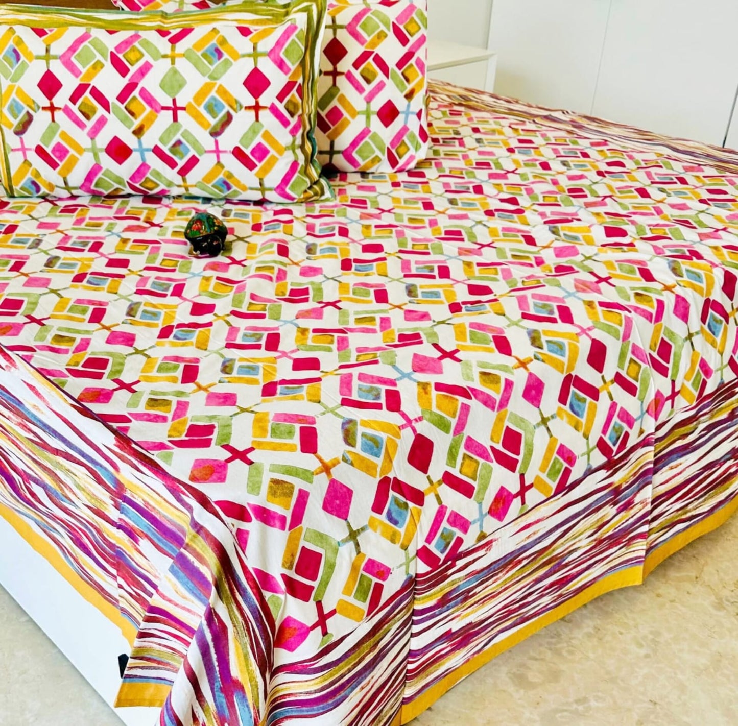 Purple Diamond Traditional Printed Bedsheet with Two Reversible Pillow Covers