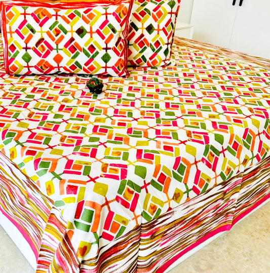 Pink Diamond Printed Bedsheet with Two Reversible Pillow Covers