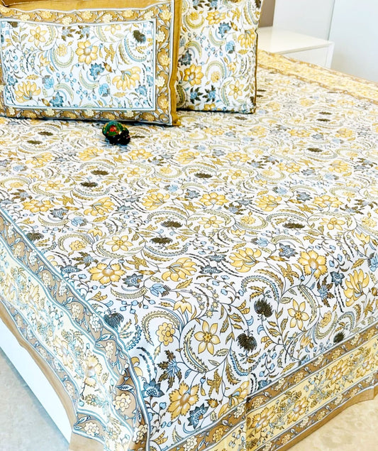 Yellow Floral Jaal Traditional Printed Bedsheet with Two Reversible Pillow Covers