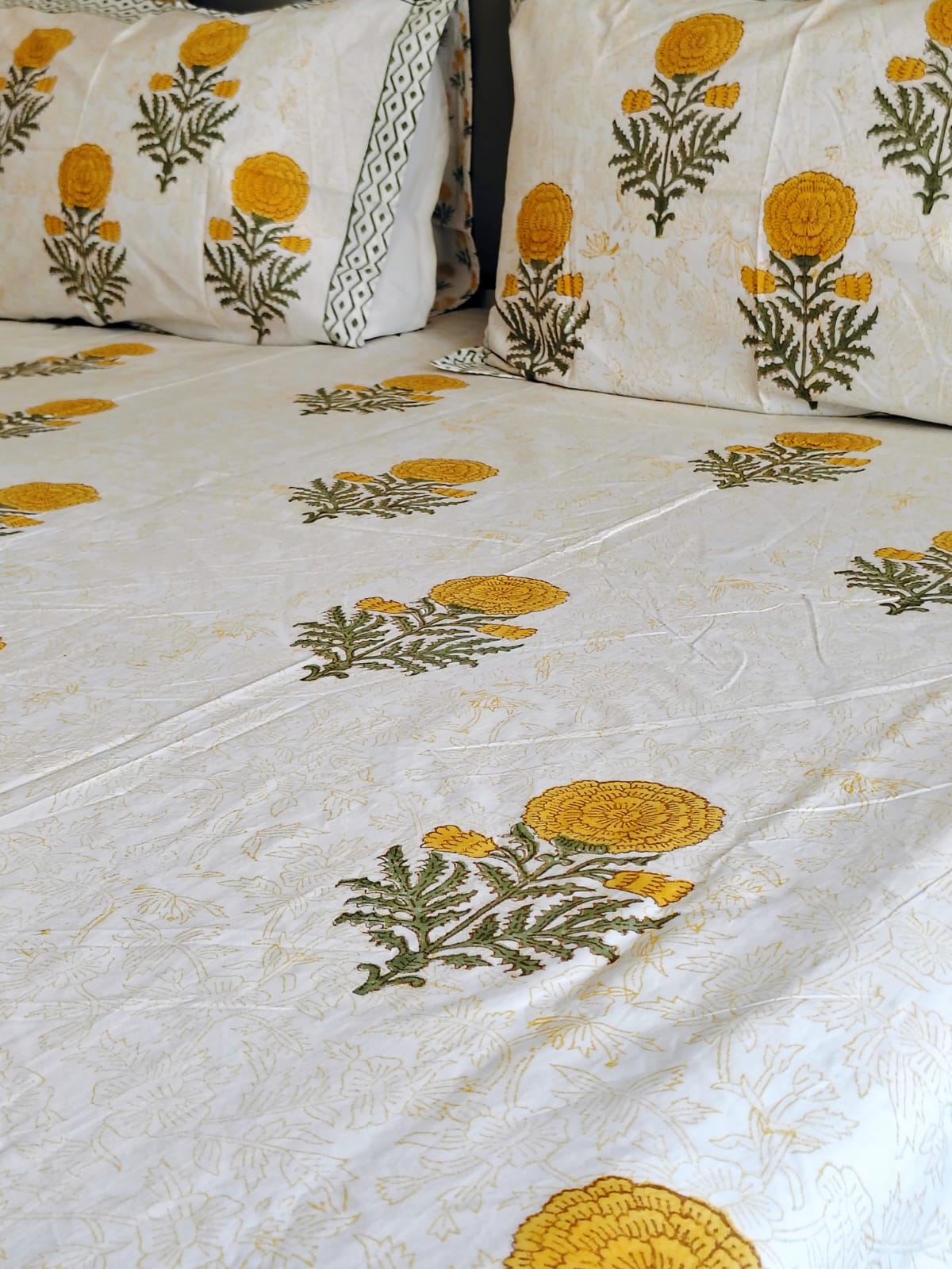 Yellow Genda Block Printed Bedsheet with Two Reversible Pillow Covers