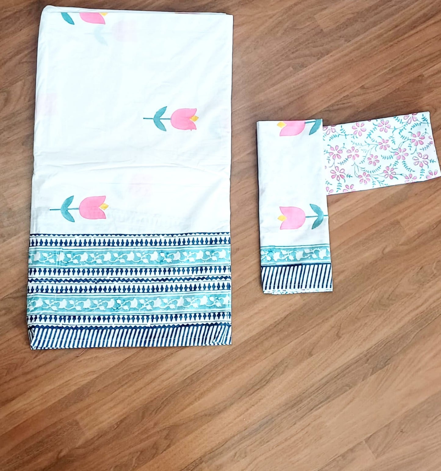 Begum Pink Tulip Block Printed Bedsheet with Two Reversible Pillow Covers
