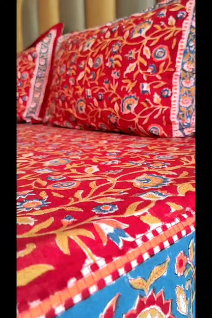 Begum Red Floral Block Printed Bedsheet with Two Reversible Pillow Covers